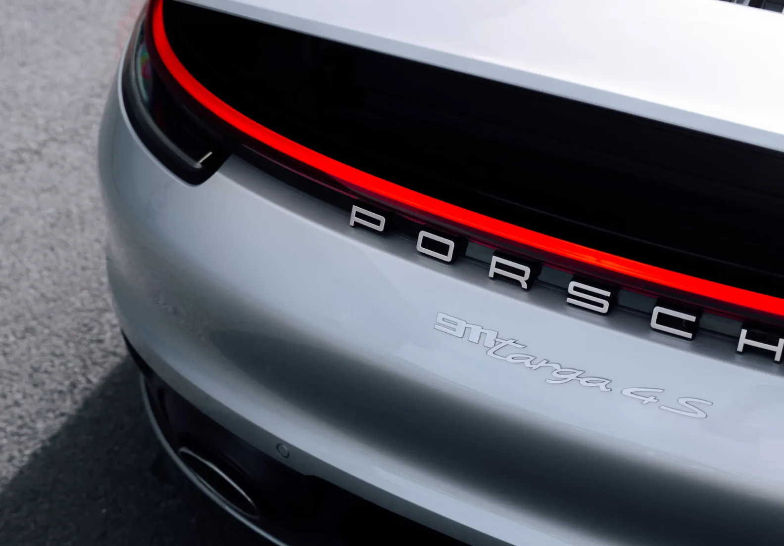 The rear of a silver Porsche 911 Targa
